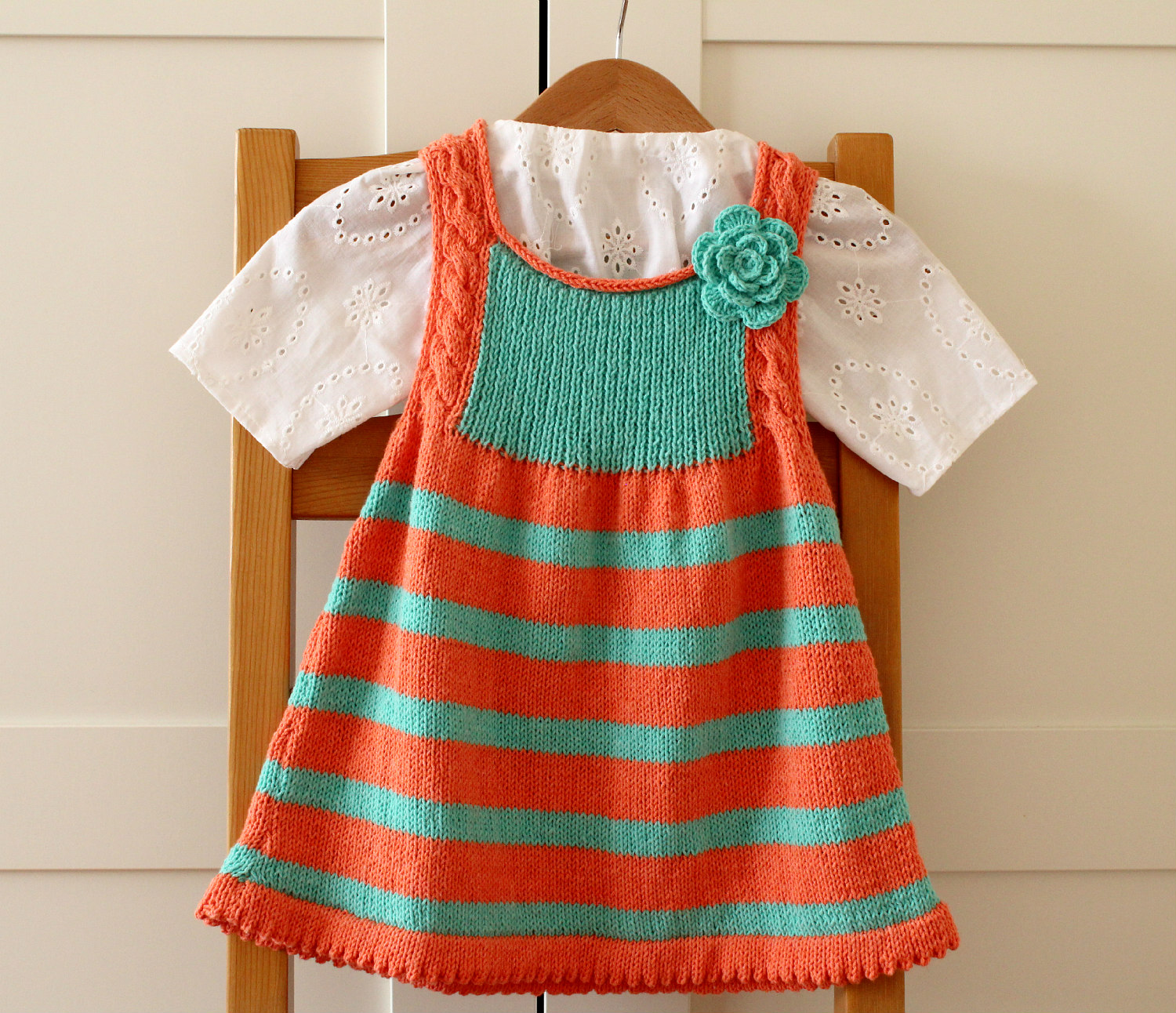 Emily Baby Dress stripes baby dress with crochet flower baby knitting pattern by Lilia Vanini / Liliacraftparty